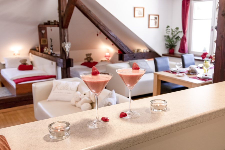 The kitchen is fully equipped with a dishwasher, oven, stovetop, toaster...