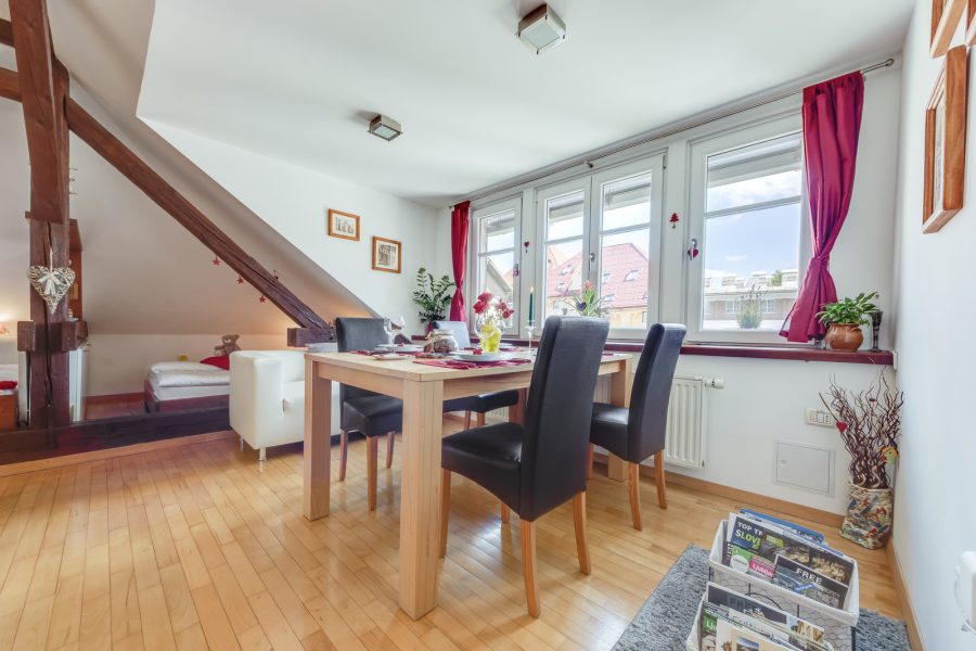 The dining area has beautiful features and a view of the surroundings.